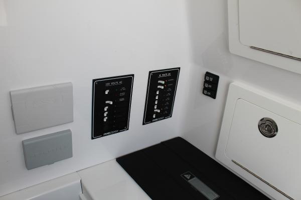 Slide: The Image of Control panel of a 2021 Onslow Bay 41 Tournament Edition boat. - 38