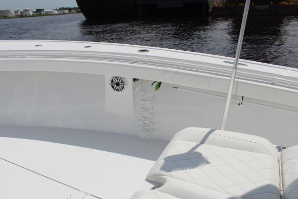 Slide: The Image of 2021 Onslow Bay 41 Tournament Edition boat interior with white seating and water view. - 40