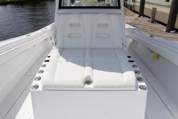 Slide: The Image of 2021 Onslow Bay 41 Tournament Edition boat with white cushioned seating. - 43