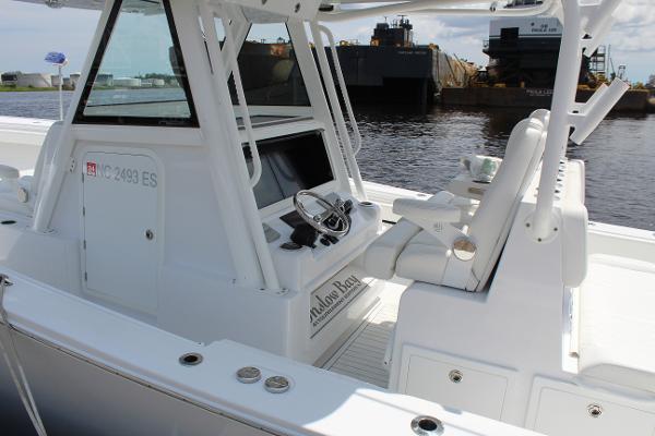 Slide: The Image of 2021 Onslow Bay 41 Tournament Edition boat cockpit and helm station. - 47