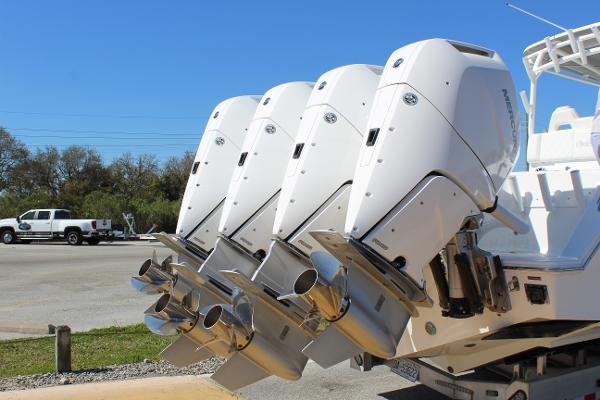 Slide: The Image of 2021 Onslow Bay 41 Tournament Edition boat with four powerful outboard motors. - 48