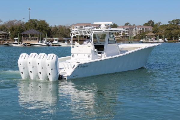 Slide: The Image of 2021 Onslow Bay 41 Tournament Edition boat with quad outboard engines on the water. - 6
