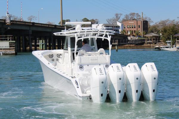 Slide: The Image of 2021 Onslow Bay 41 Tournament Edition boat with quad engines on the water. - 7
