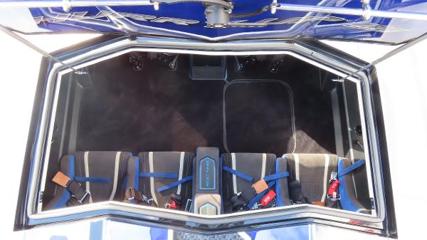 Slide: The Image of 2020 Outerlimits 46SC cockpit with blue and gray seating and safety harnesses. - 24