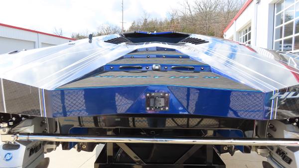 Slide: The Image of 2020 Outerlimits 46SC powerboat rear view with sleek design and metallic finish. - 30