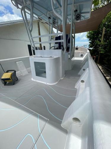 Slide: The Image of 2022 Panga Eduardoño Corvina 32 ft Panga boat deck with modern design and equipment. - 12