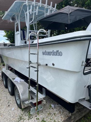 Slide: The Image of 2022 Panga Eduardoño Corvina 32 ft boat on trailer. - 26