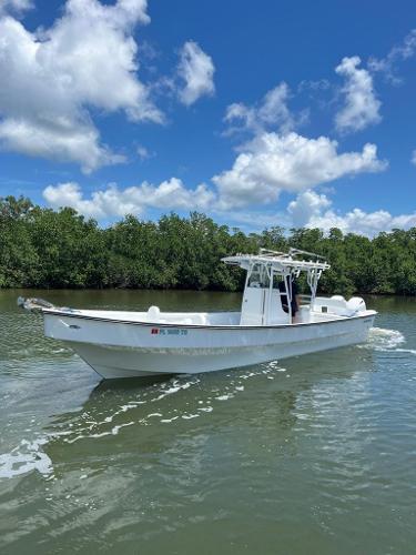 Slide: The Image of 2022 Panga Eduardoño Corvina 32 ft boat cruising on a sunny day. - 4