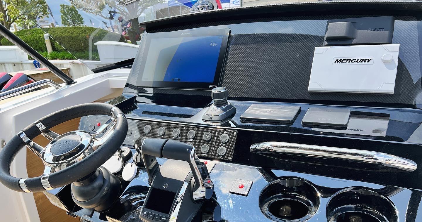 Slide: The Image of Helm of 2025 Pardo Yachts 38 Outboard featuring advanced navigation and control systems. - 15