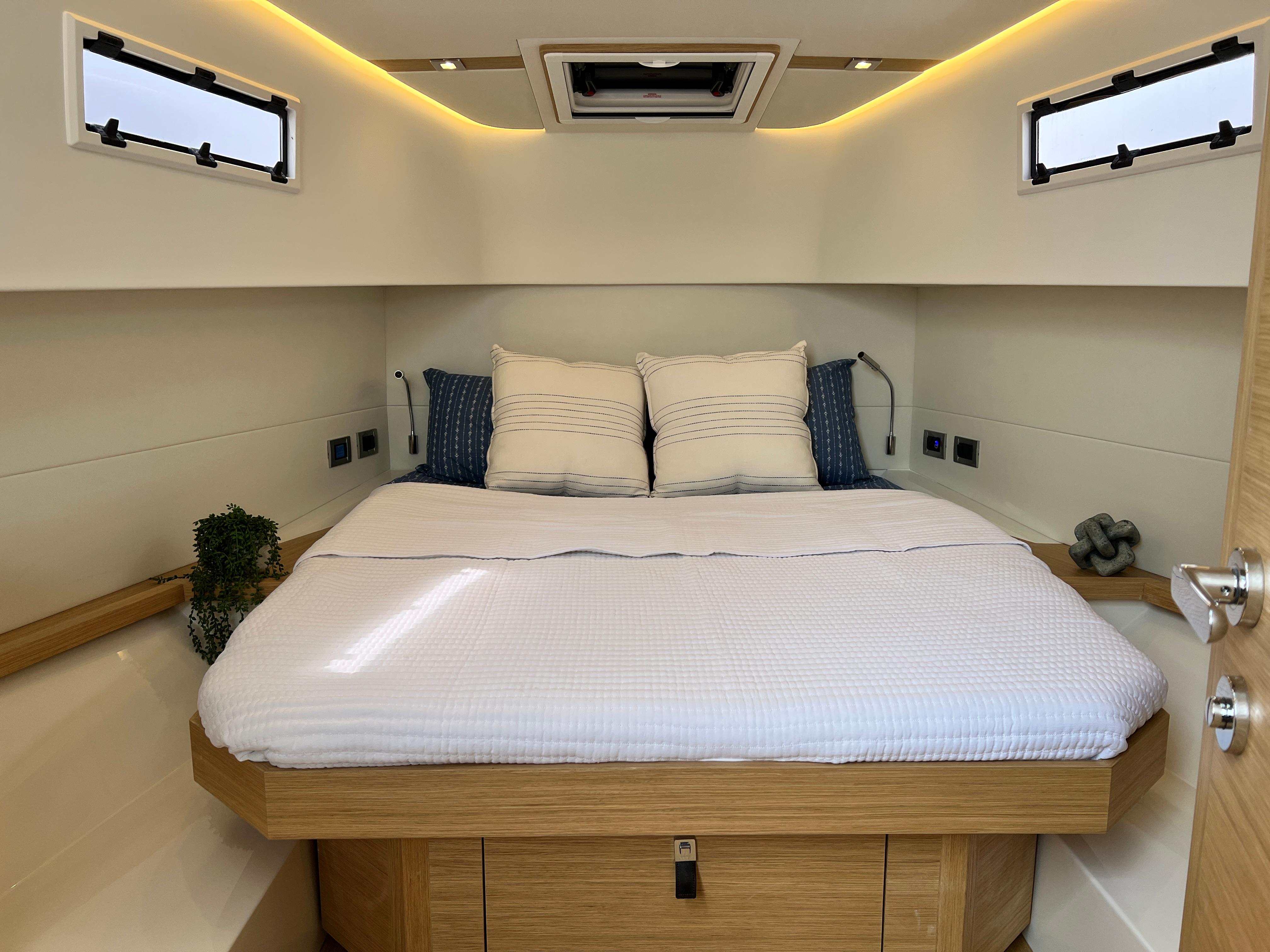 Slide: The Image of Luxurious cabin interior of 2025 Pardo Yachts 38 Outboard with cozy bedding. - 22