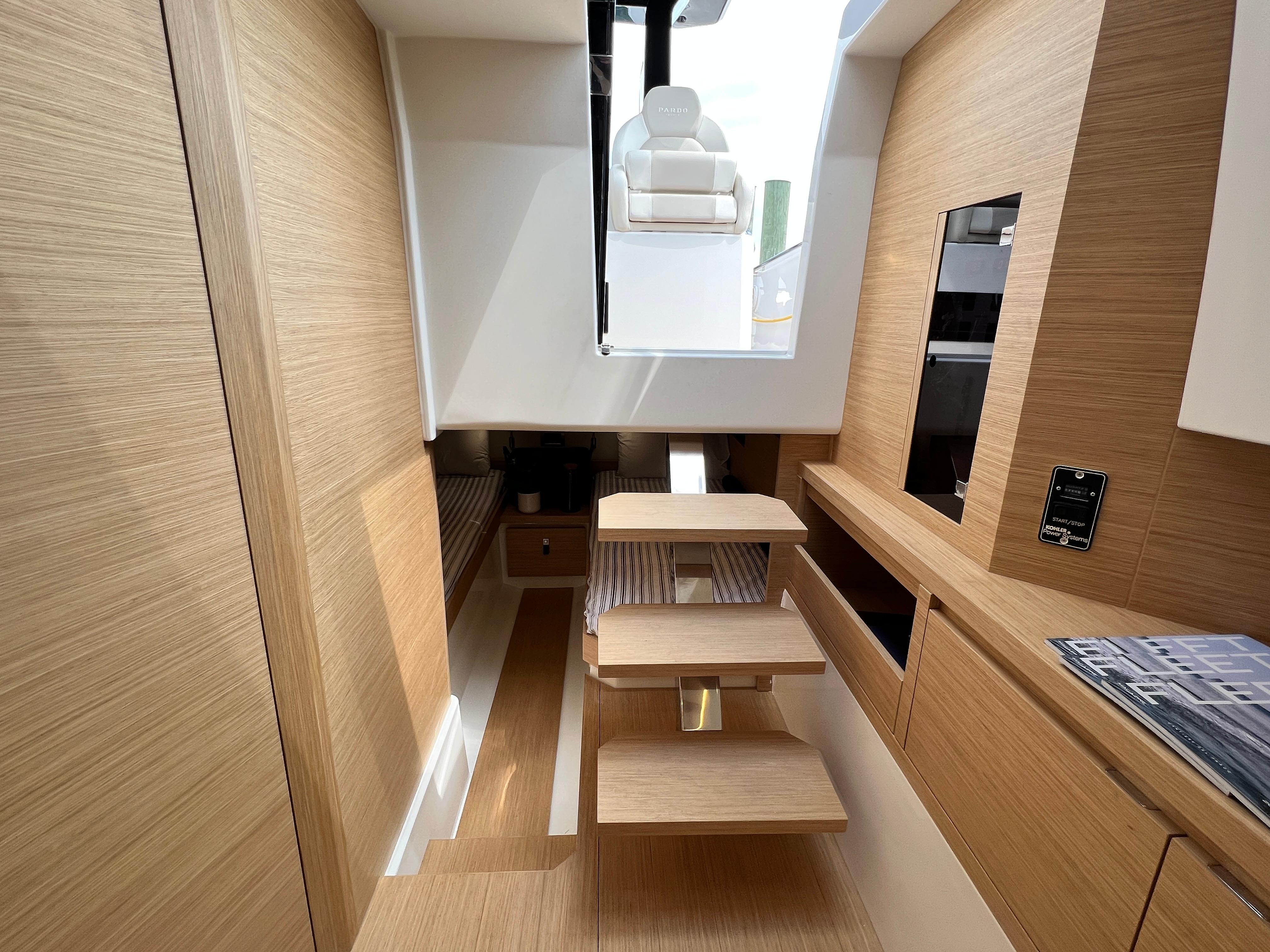 Slide: The Image of 2025 Pardo Yachts 38 Outboard interior with modern wood finish and sleek design. - 29