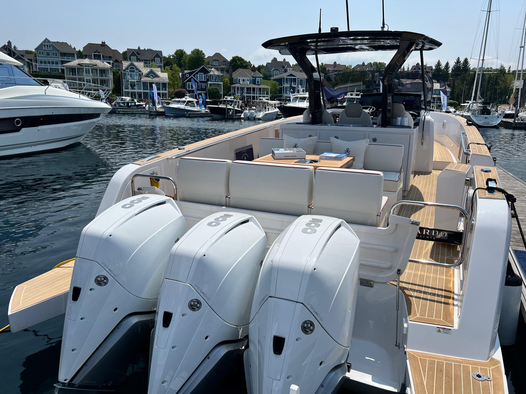 Slide: The Image of 2025 Pardo Yachts 38 Outboard docked, showcasing sleek design and triple outboard engines. - 6