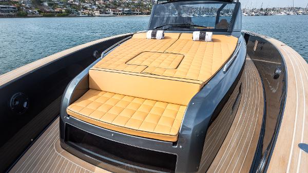 Slide: The Image of 2022 Pardo Yachts 50 with luxurious deck seating on calm waters. - 25
