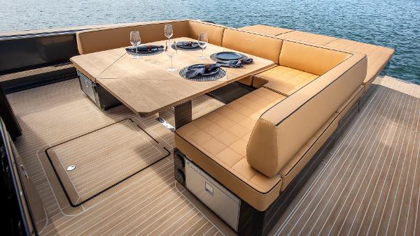 Slide: The Image of Luxurious dining area on 2022 Pardo Yachts 50, featuring elegant tableware and comfortable seating. - 27
