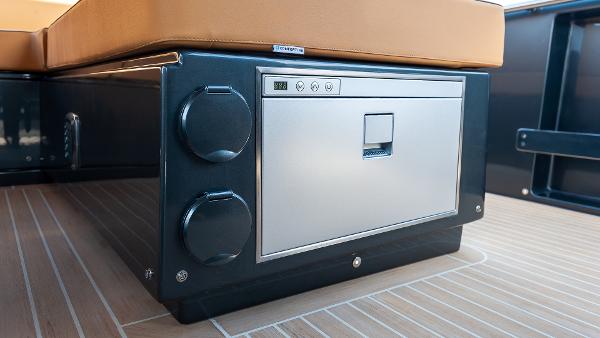 Slide: The Image of Luxury seating area on 2022 Pardo Yachts 50 with integrated storage. - 32