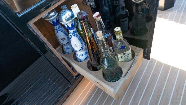 Slide: The Image of Luxury yacht bar with assorted bottles, Pardo Yachts 50, 2022 model. - 35