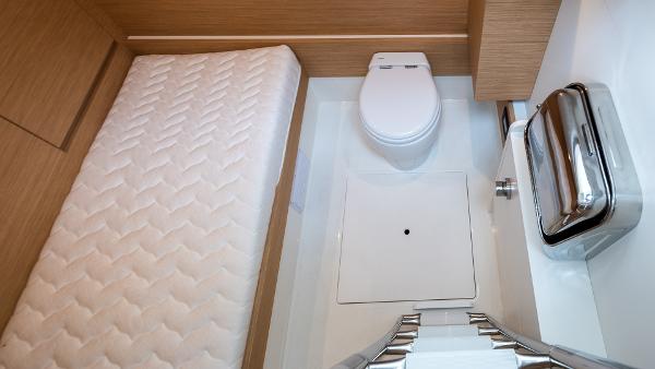 Slide: The Image of Compact bathroom in 2022 Pardo Yachts 50, featuring a toilet and modern design elements. - 38