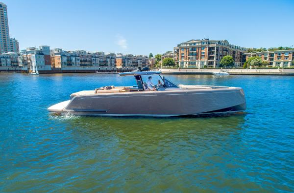 Slide: The Image of 2025 Pardo Yachts 50 cruising in urban waterfront area. - 0