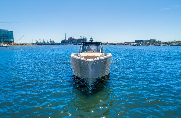 Slide: The Image of 2025 Pardo Yachts 50 on open water with cityscape background. - 3