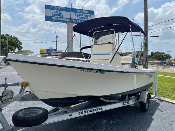 Slide: The Image of 2004 Parker 1801 Center Console boat on Continental trailer at dealership. - 0