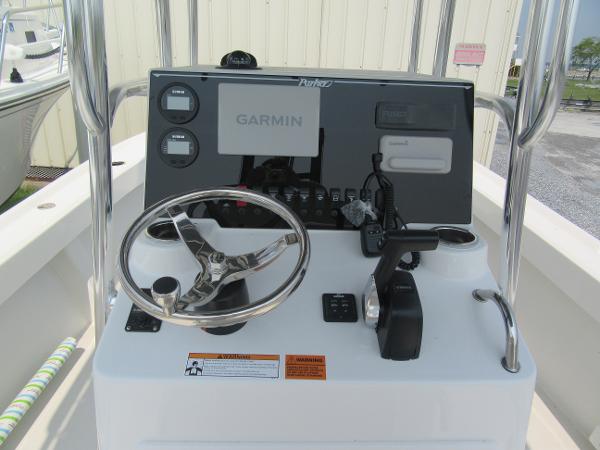 Slide: The Image of Control console of a 2024 Parker 2100 Special Edition boat with Garmin navigation system. - 2