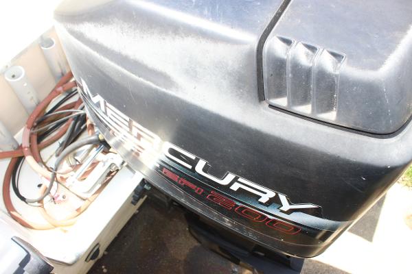 Slide: The Image of Mercury 200 outboard motor on 1996 Parker 2110 Walkaround boat. - 13