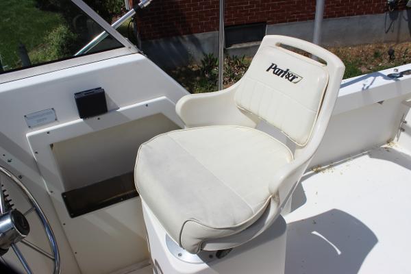 Slide: The Image of 1996 Parker 2110 Walkaround boat captain's chair in white. - 20