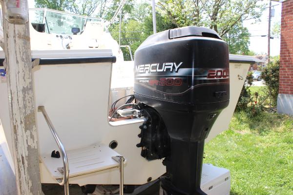 Slide: The Image of 1996 Parker 2110 Walkaround boat with Mercury 200 outboard motor. - 37