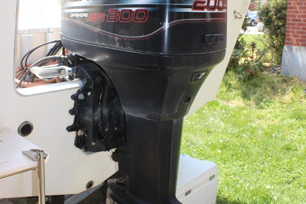 Slide: The Image of 1996 Parker 2110 Walkaround boat with a 200 HP outboard motor. - 38