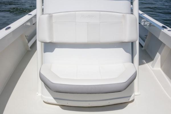 Slide: The Image of Manufacturer Provided Image: 2025 Parker 23SE Center Console boat with white cushioned seating. - 6