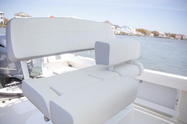 Slide: The Image of Manufacturer Provided Image: 2025 Parker 23SE Center Console boat seat with waterfront view. - 8