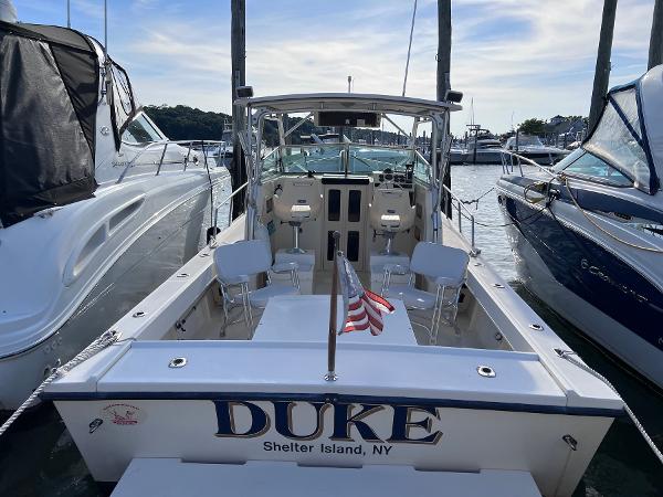 Slide: The Image of 2002 Parker 2510 Walkaround boat docked at Shelter Island, NY. - 21