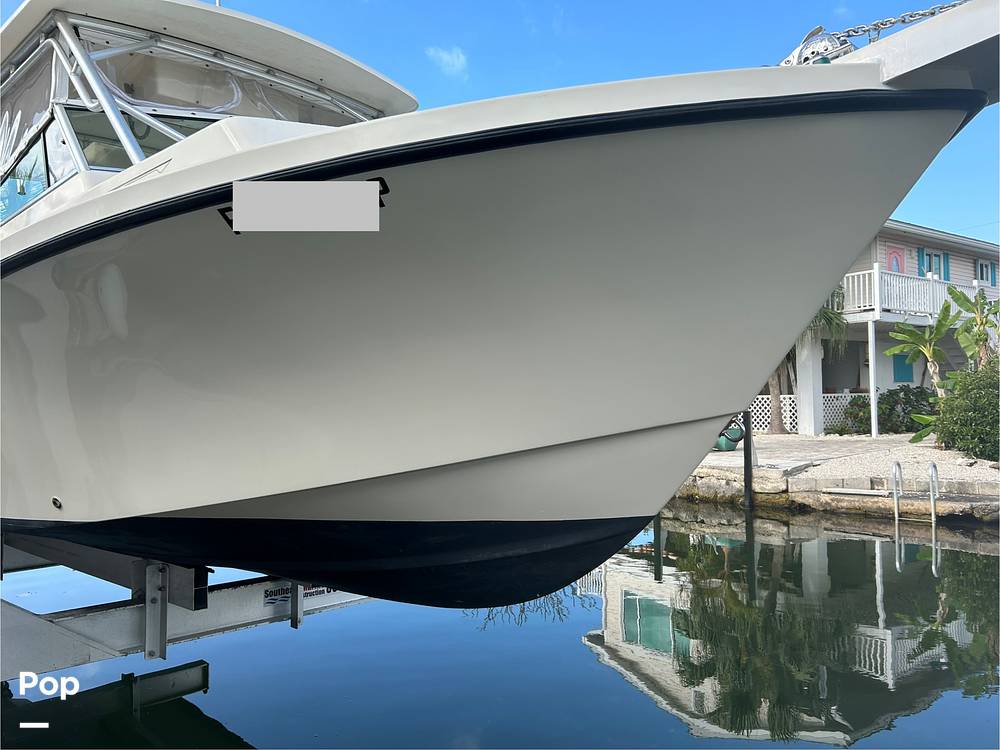 Slide: The Image of Parker Marine 2510 Walkaround Deep V 2004 - 15235614