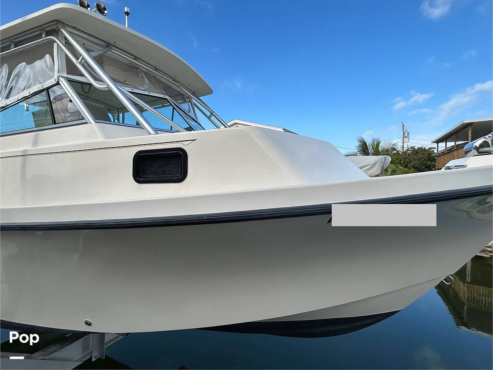 Slide: The Image of Parker Marine 2510 Walkaround Deep V 2004 - 15235618
