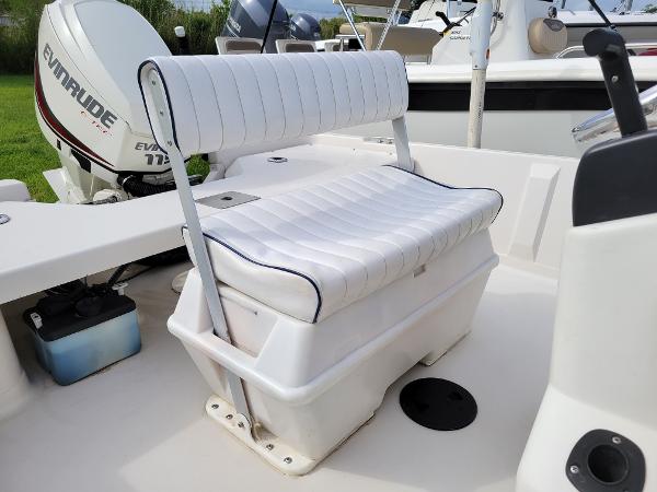 Slide: The Image of 2001 Pathfinder 1806V boat with white cushioned seating and Evinrude outboard motor. - 10