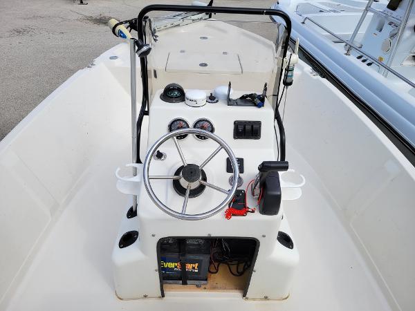 Slide: The Image of 2001 Pathfinder 1806V boat console with steering wheel and gauges. - 3