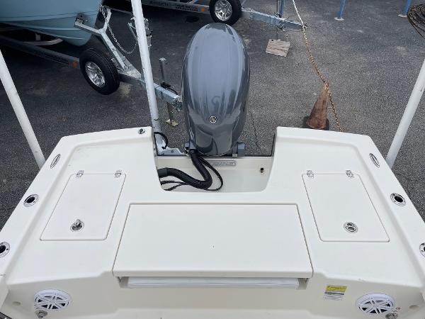Slide: The Image of 2024 Pathfinder 2200 TRS boat with outboard motor, rear deck view. - 15