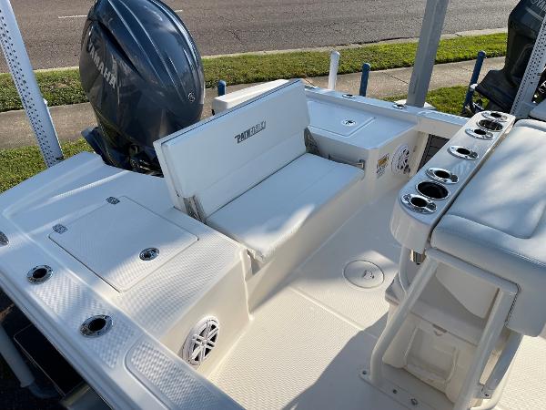 Slide: The Image of 2024 Pathfinder 2200 TRS boat interior with Yamaha engine and seating area. - 17