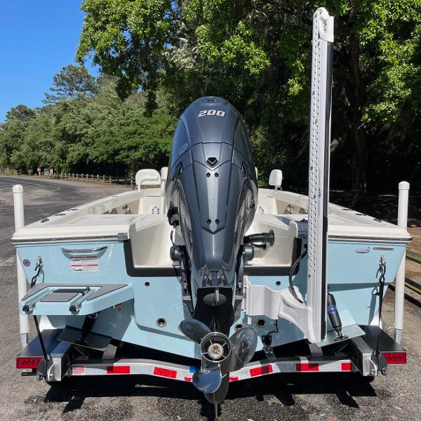 Slide: The Image of 2024 Pathfinder 2200 TRS boat with 200 HP engine, rear view. - 2