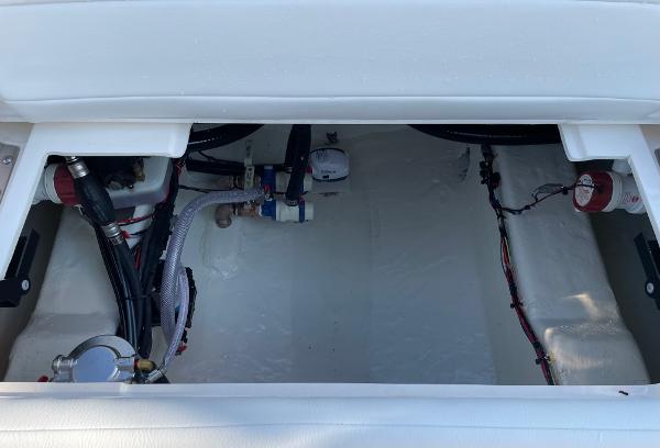 Slide: The Image of 2024 Pathfinder 2200 TRS boat interior wiring and plumbing system. - 21