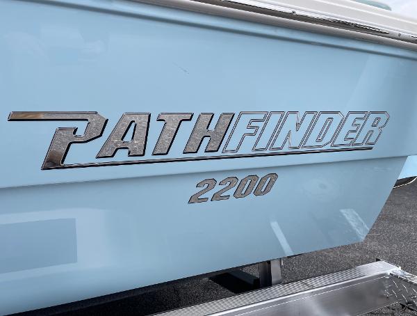 Slide: The Image of 2024 Pathfinder 2200 TRS boat side view with logo. - 4
