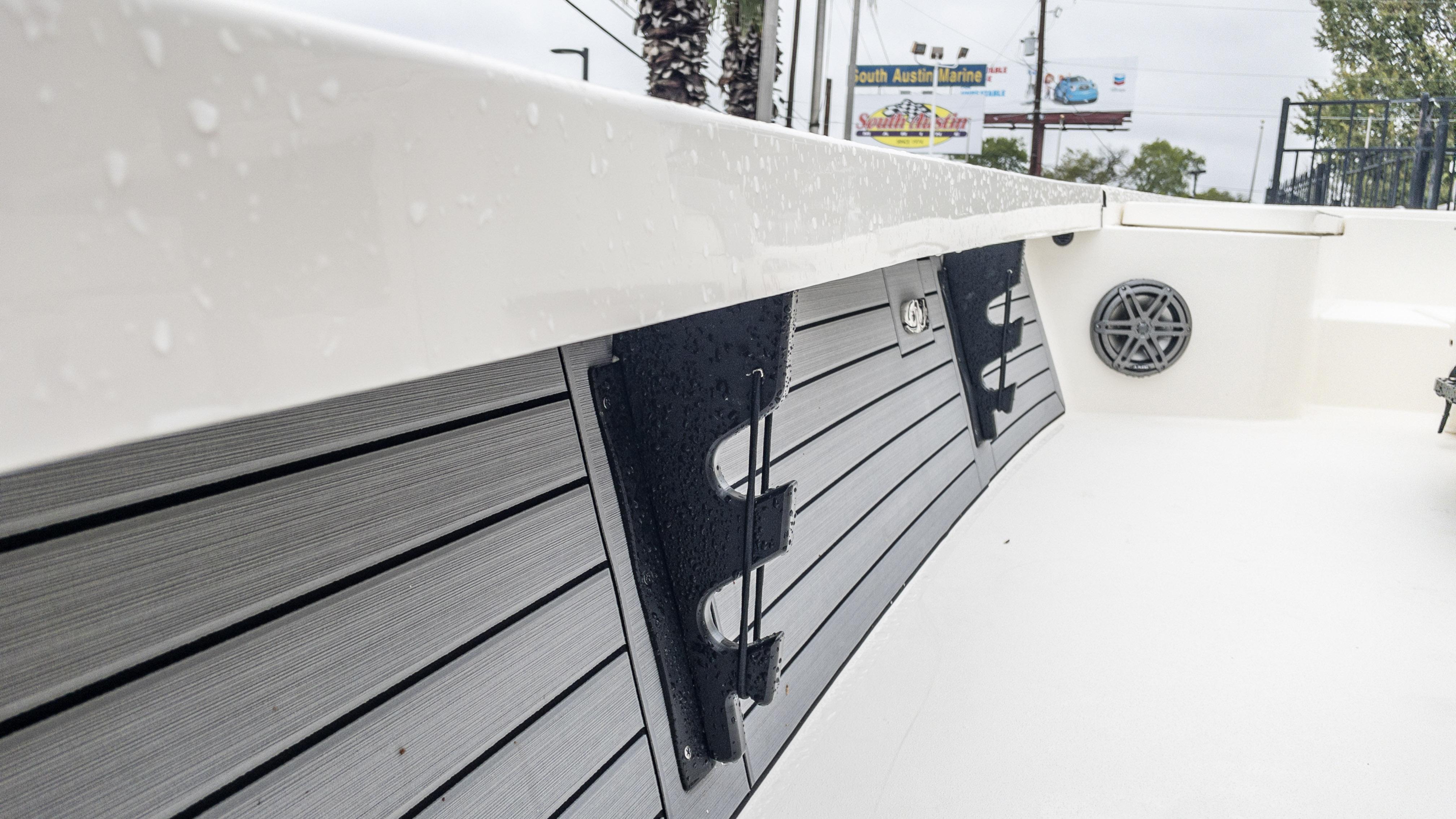 Slide: The Image of 2024 Pathfinder 2300 HPS boat interior with wet deck and speaker. - 2