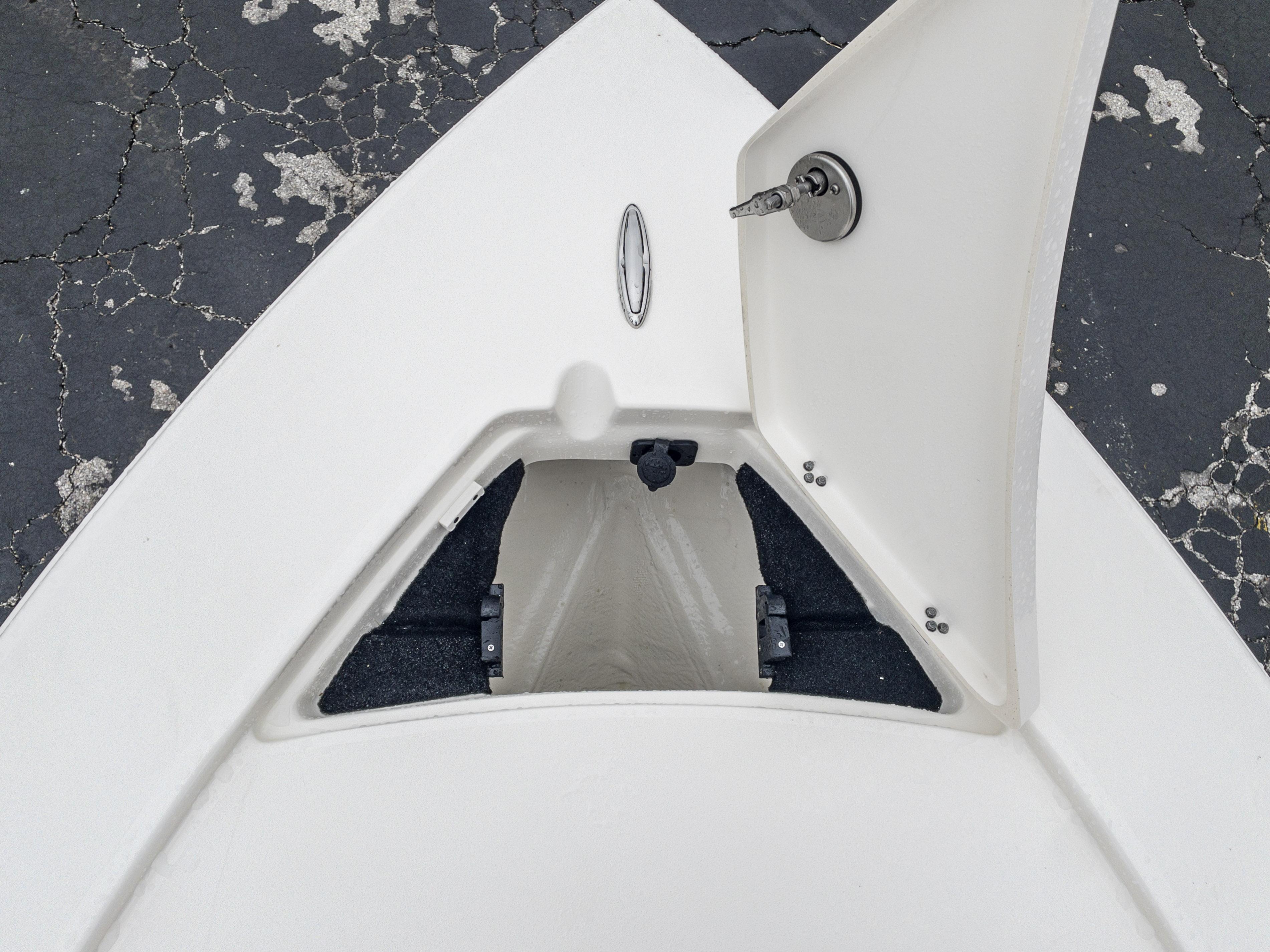 Slide: The Image of Open storage compartment on the 2024 Pathfinder 2300 HPS boat. - 22