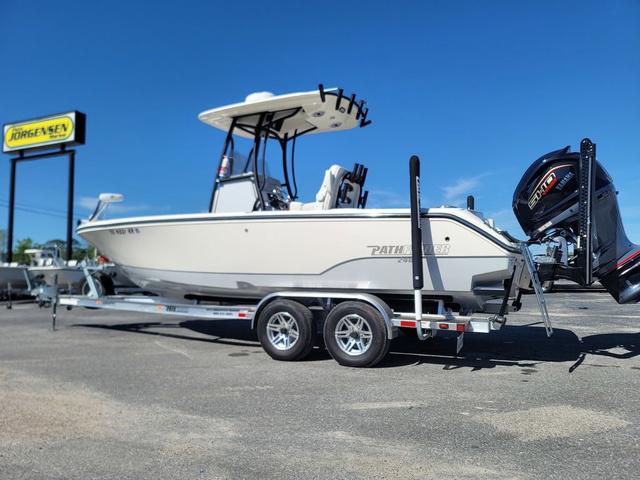 Slide: The Image of 2023 Pathfinder 2400 Open boat on trailer, displayed outdoors under clear blue sky. - 1