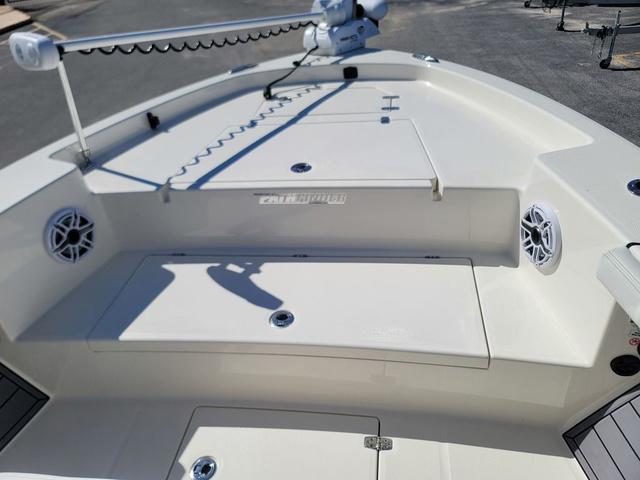 Slide: The Image of 2023 Pathfinder 2400 Open boat deck with storage compartments and speakers. - 5