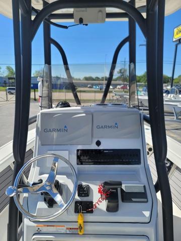 Slide: The Image of 2023 Pathfinder 2400 Open boat console with Garmin electronics and steering wheel. - 8