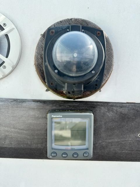 Slide: The Image of Raymarine instrument and compass on 1978 Pearson 26 sailboat. - 11