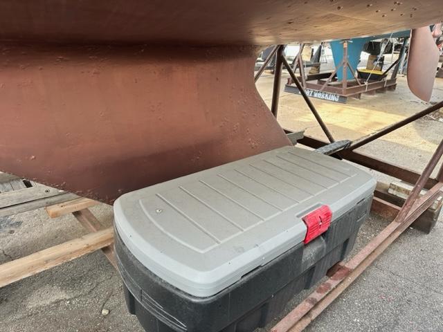 Slide: The Image of 1978 Pearson 26 sailboat keel with storage container underneath. - 4