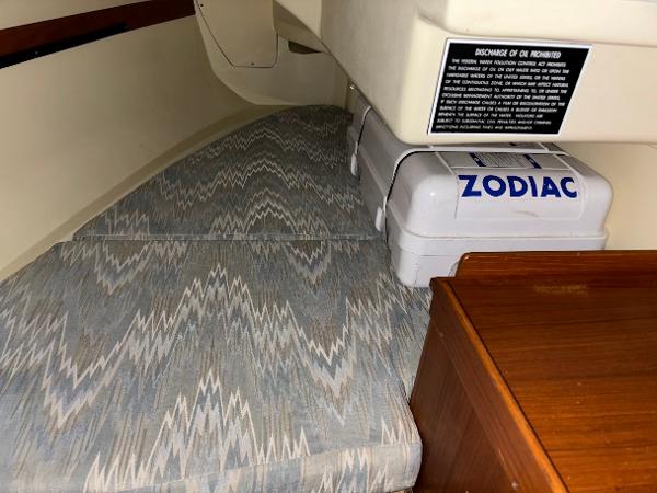 Slide: The Image of Interior cabin of 1989 Pearson 31 sailboat with Zodiac storage box. - 30