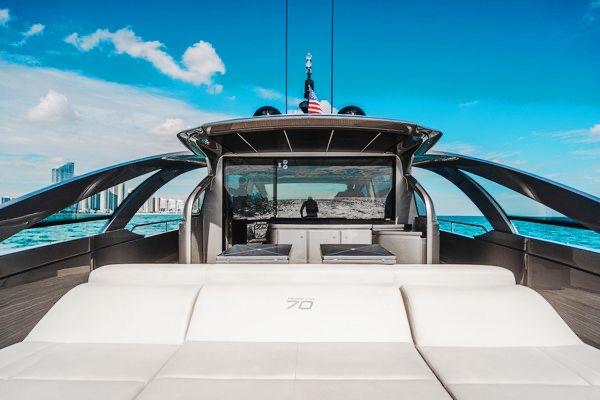 Slide: The Image of Luxurious 2015 Pershing 70 yacht with sleek design, cruising on a sunny day. - 29